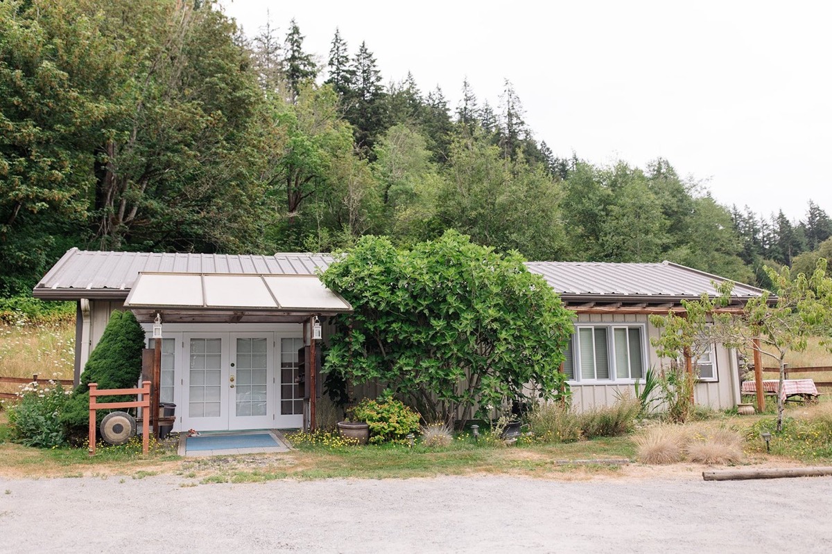 The Aham Yoga studio grounds at the base of Union Hill in Redmond, five acres of open land and trees.